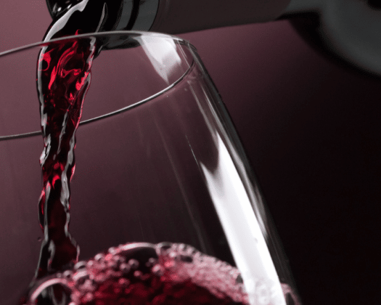 Wine bottle pour into glass